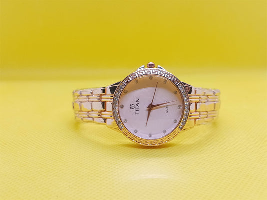 Titan Rose Gold Ladies Watch – Elegant Crystal Bezel Design