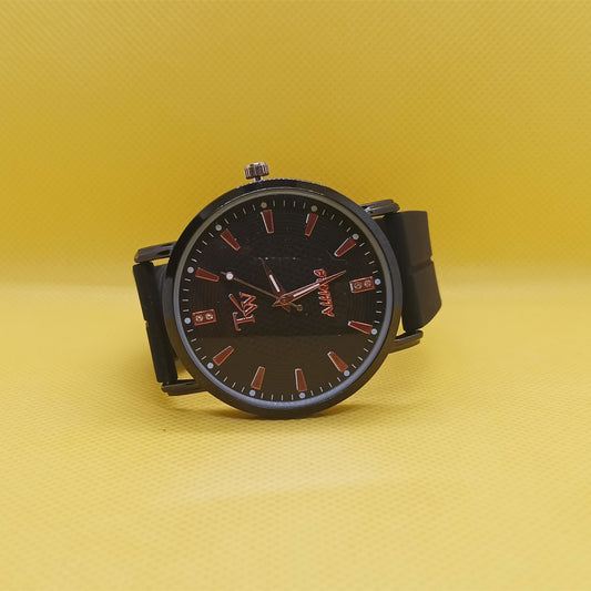 Black watch with red accents on a yellow background