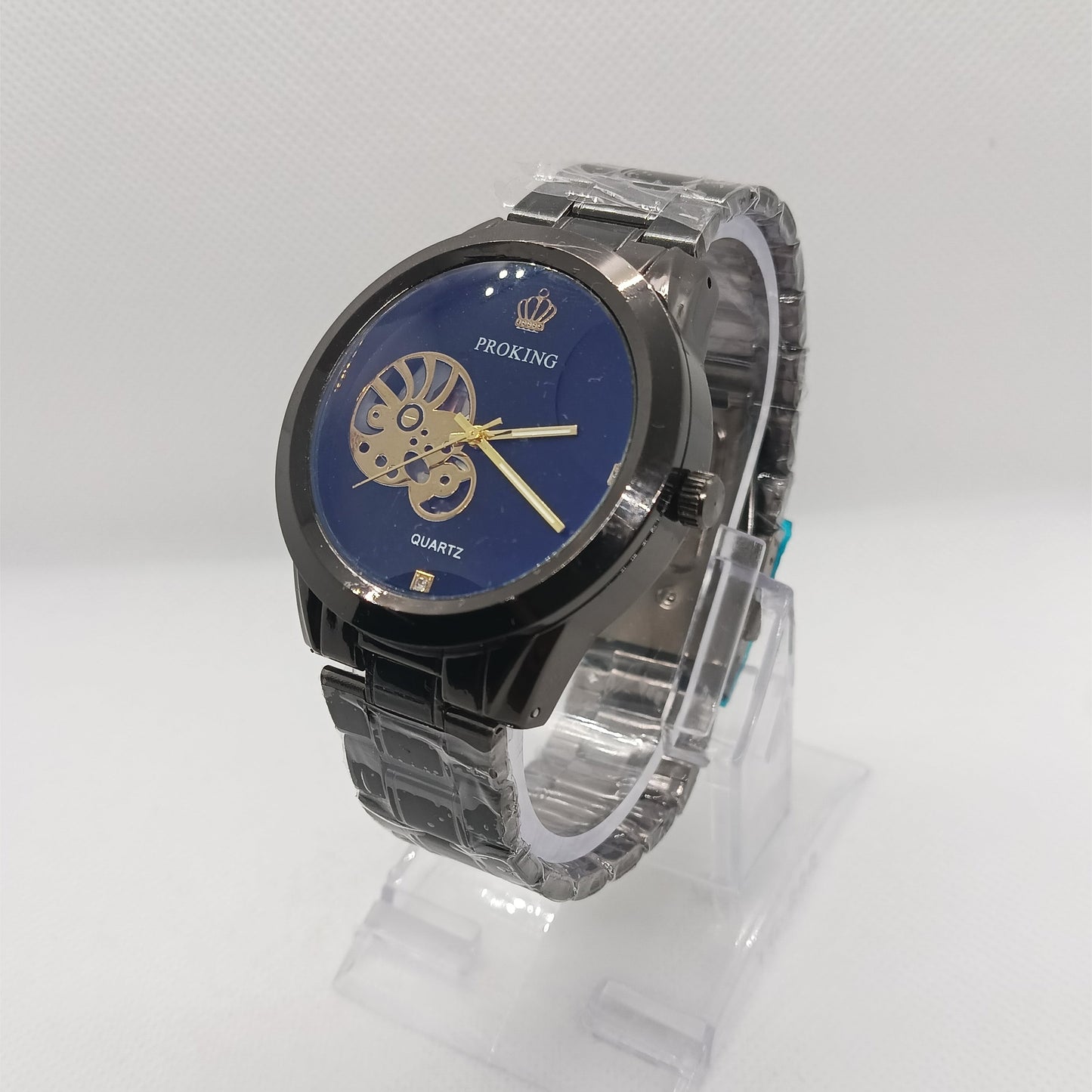 Watch with a blue face and silver case on a white background