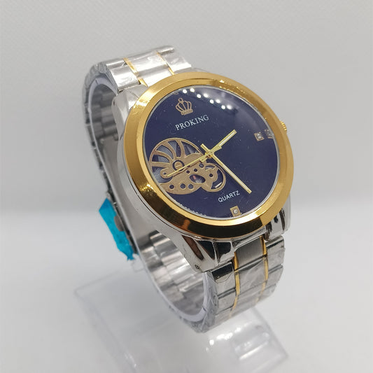Silver and gold watch with blue face on a white background