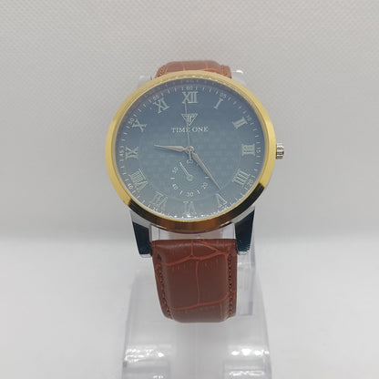 Watch with brown leather strap and gold case on a white background
