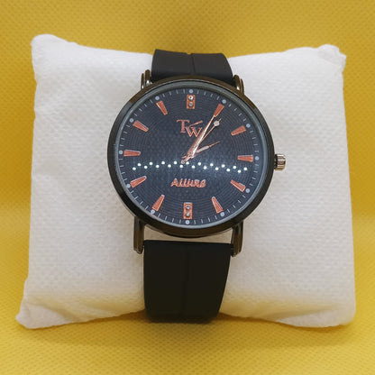 Watch with black strap and blue face on a white cushion against a yellow background
