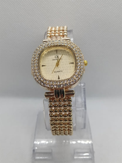 Elegant Champagne Gold Dial with Crystal Bezel