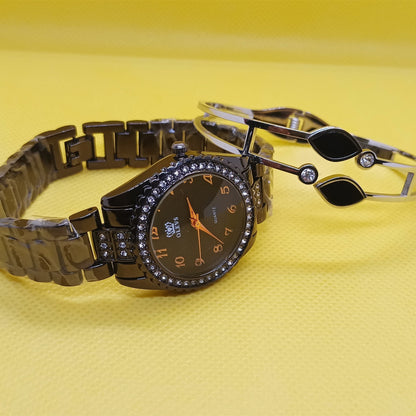 Black watch and bracelet set on a yellow background