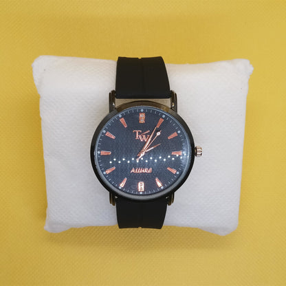 Watch with black strap and blue dial on a white cushion against a yellow background