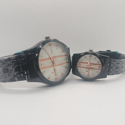 Two watches with black straps on a white background