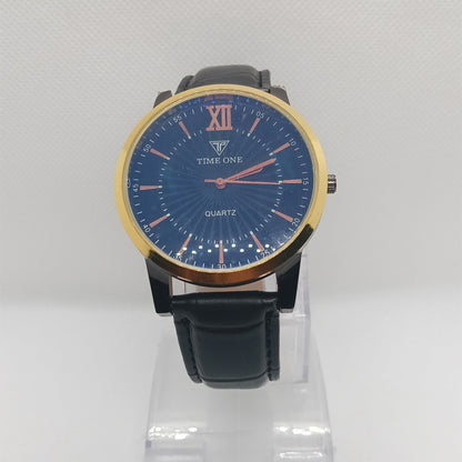 Wristwatch with blue dial and black strap on a white background