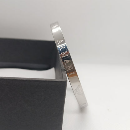 Silver Armani bracelet on a white background