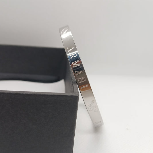 Silver Armani bracelet on a white background