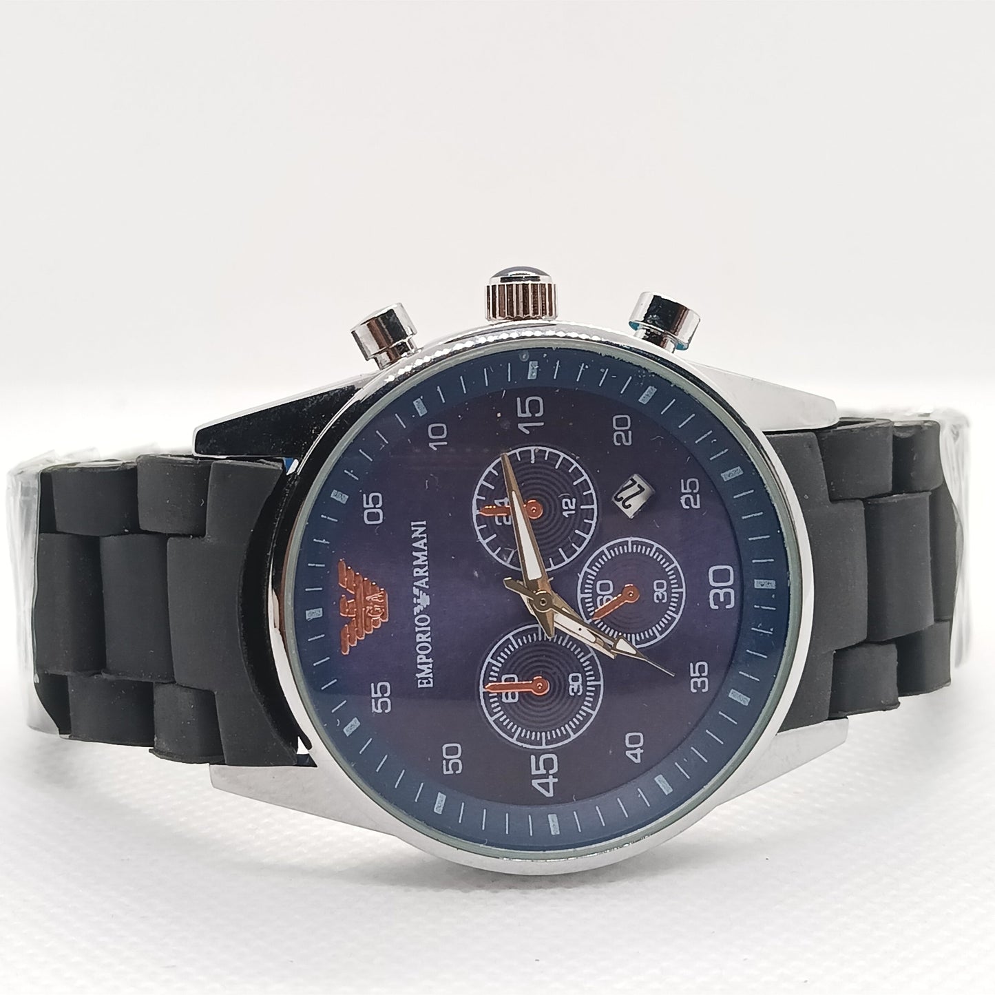 Wristwatch with black strap and blue dial on a white background