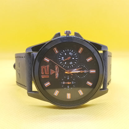 Black wristwatch with a detailed face on a yellow gradient background