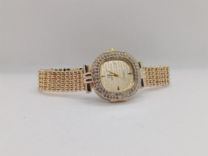 Elegant Champagne Gold Dial with Crystal Bezel