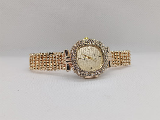Elegant Champagne Gold Dial with Crystal Bezel